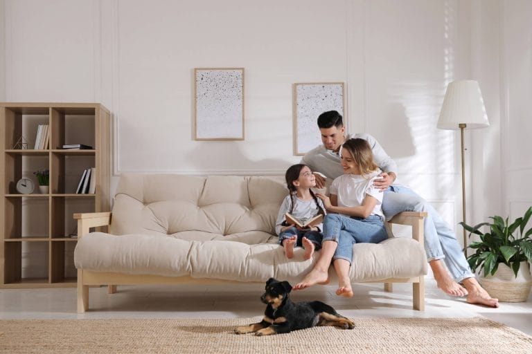 Family Relaxing in Living Room After Radon Testing Services
