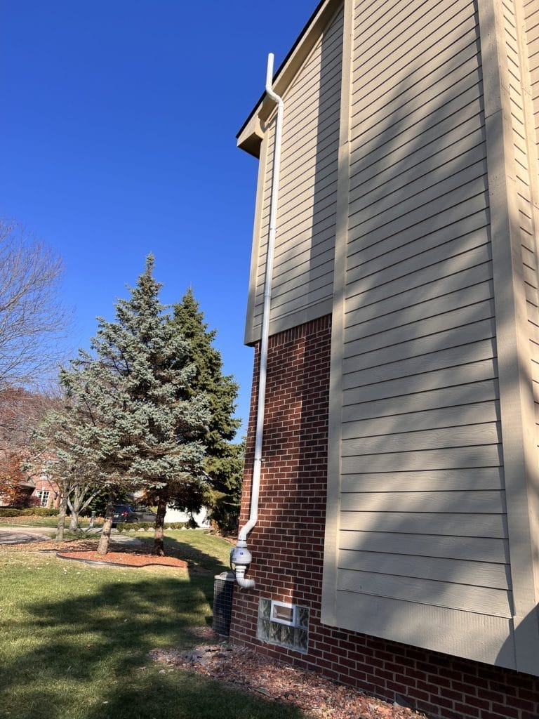 Radon mitigation system installed on a house in Indianapolis
