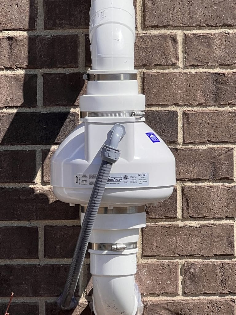 Radon Mitigation System on Brick Wall in Indianapolis
